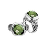 Handcrafted Bali silver ring with cushion-cut Green Amethyst Quartz and artisan floral carvings.